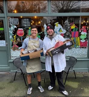 The Andy's Cafe team outside the shop